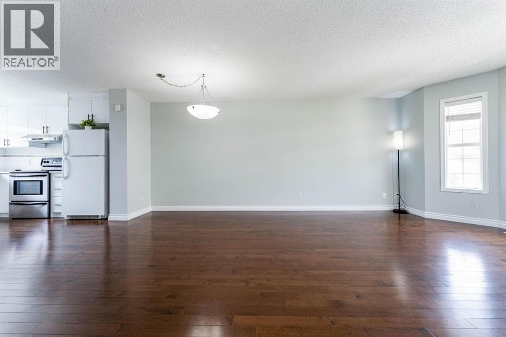 45 Tuscany Springs Garden NW — photo 4