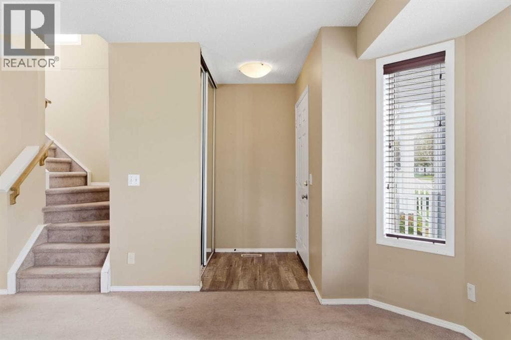 109 Arbour Wood Mews NW — photo 2