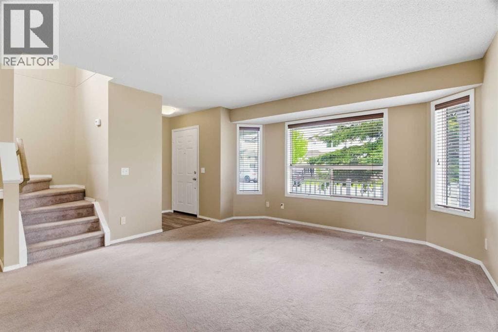 109 Arbour Wood Mews NW — photo 3