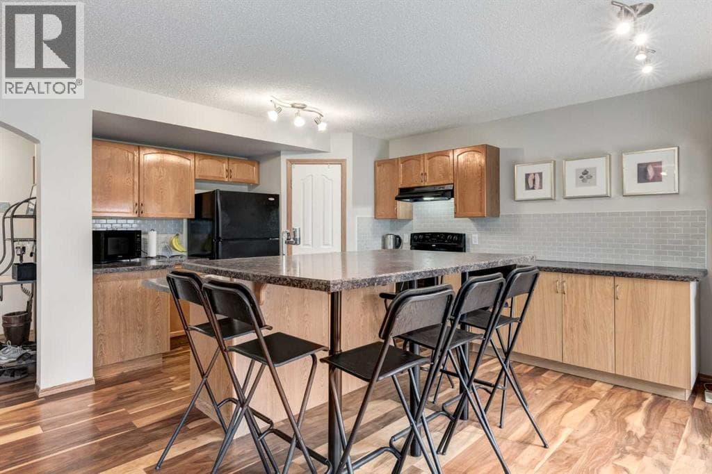 427 Tuscany Ridge Heights NW — photo 3
