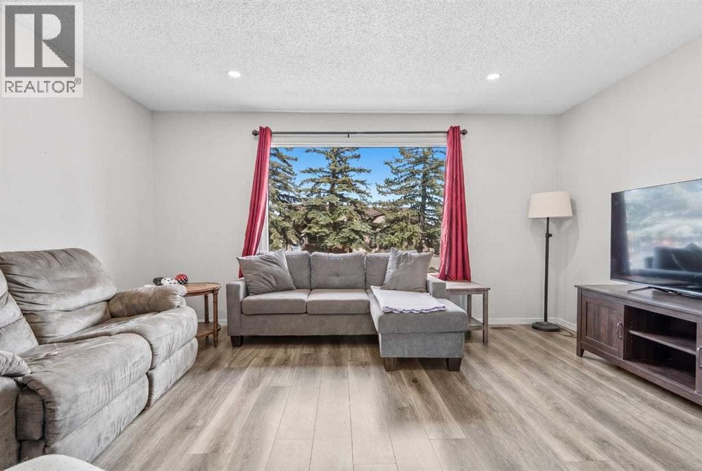 4 bed 3 bath single family at 84 Falconridge Place NE — $475,000
