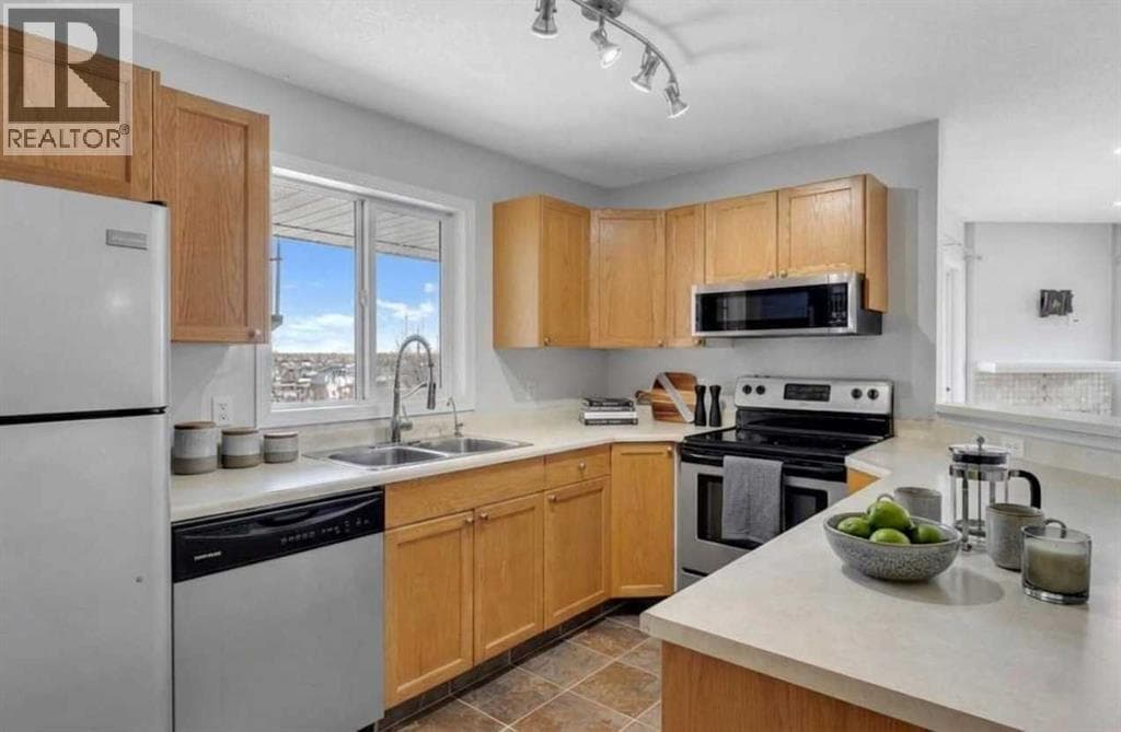 2302, 20 Harvest Rose Park NE — photo 4