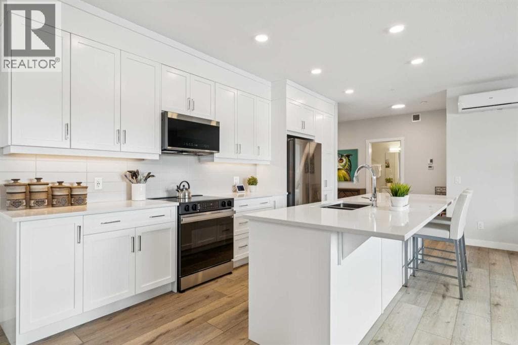 313, 125 Wolf Hollow Crescent SE