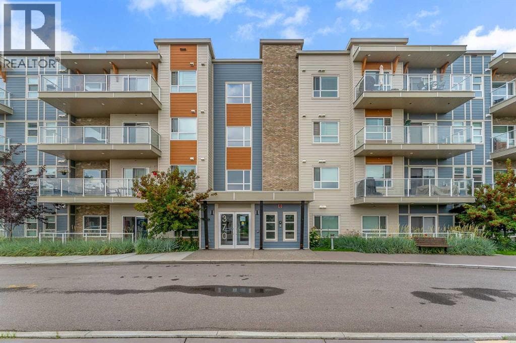 108, 370 Harvest Hills Common NE — photo 2