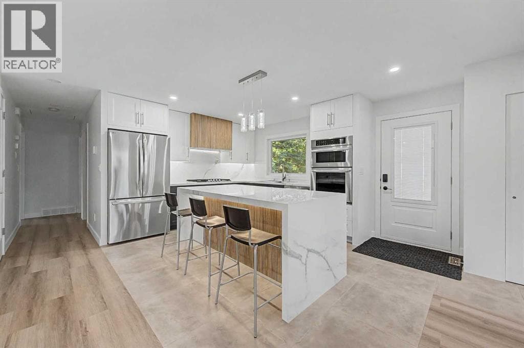 12108 Lake Waterton Way SE — photo 4