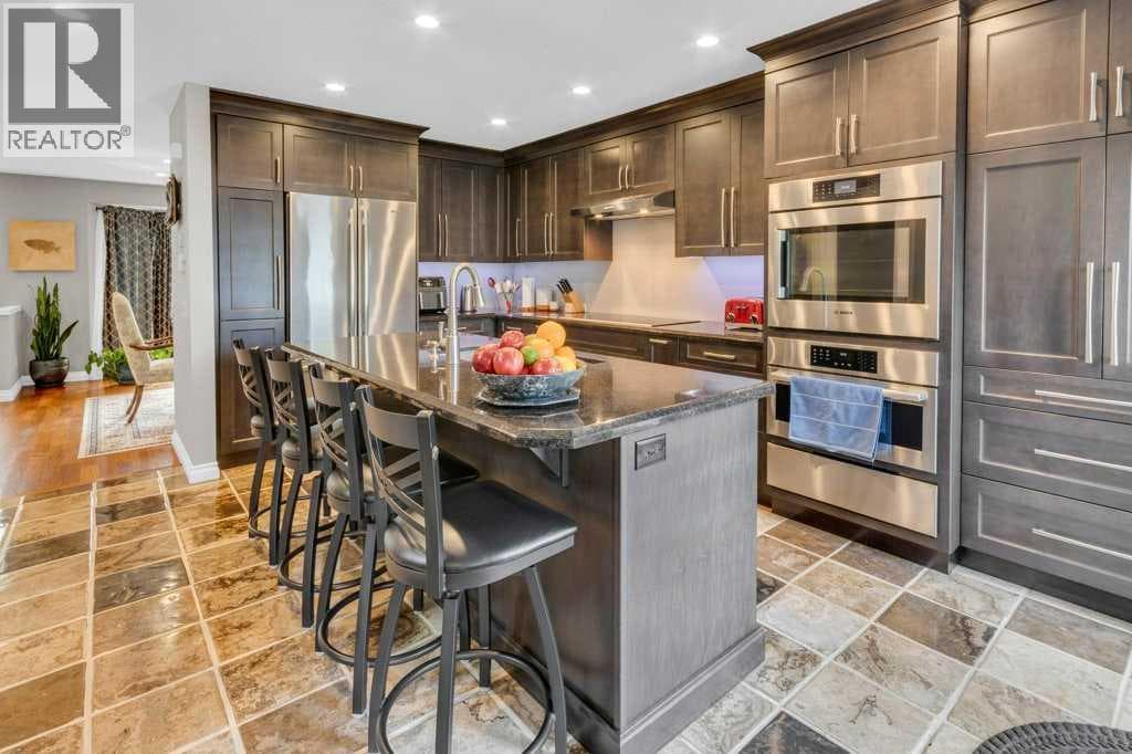 42 River Rock Green SE — photo 2
