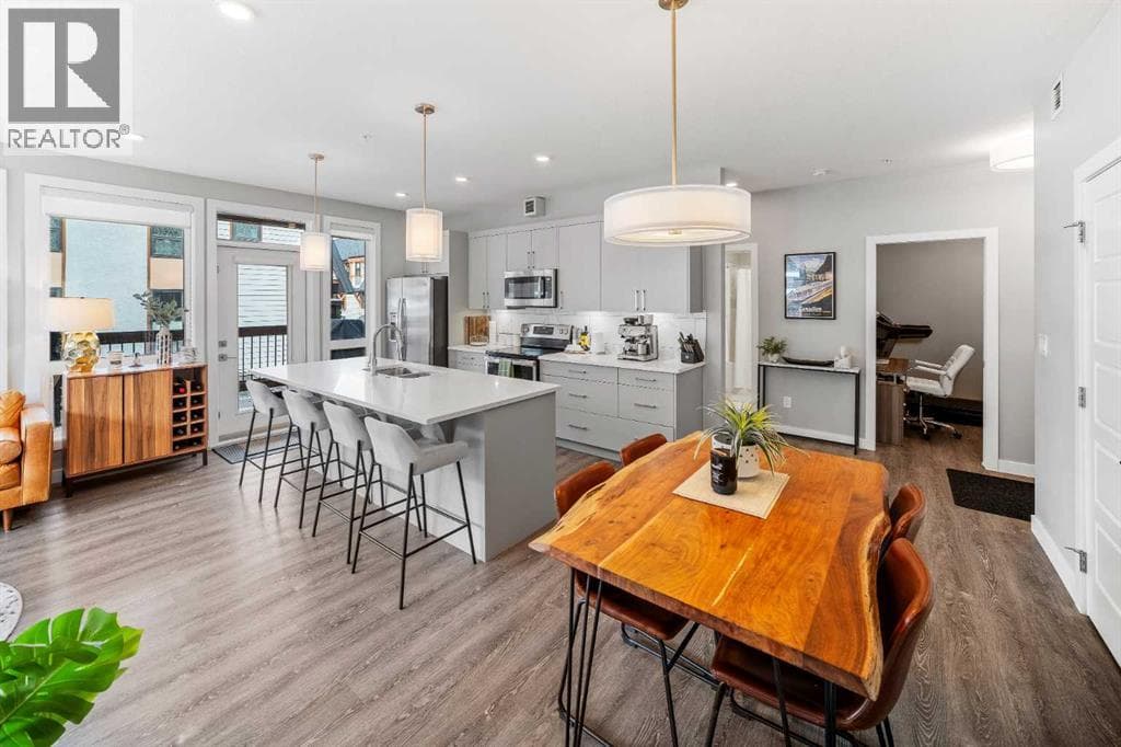 205, 106 Stewart Creek Rise — photo 3
