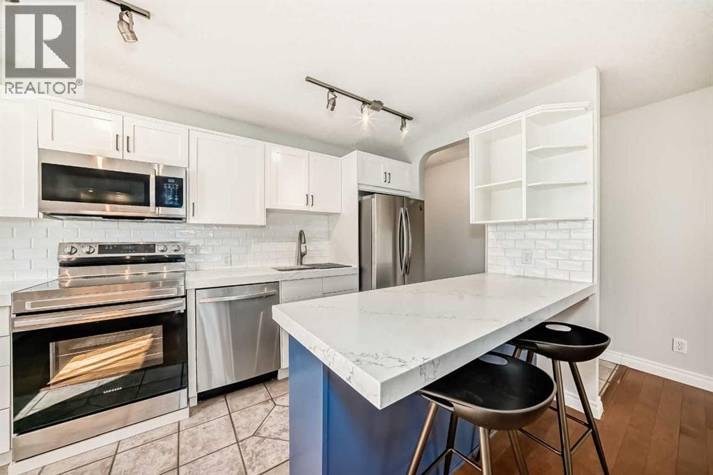 303, 835 18 Avenue SW — photo 3