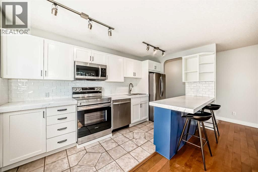 303, 835 18 Avenue SW — photo 4