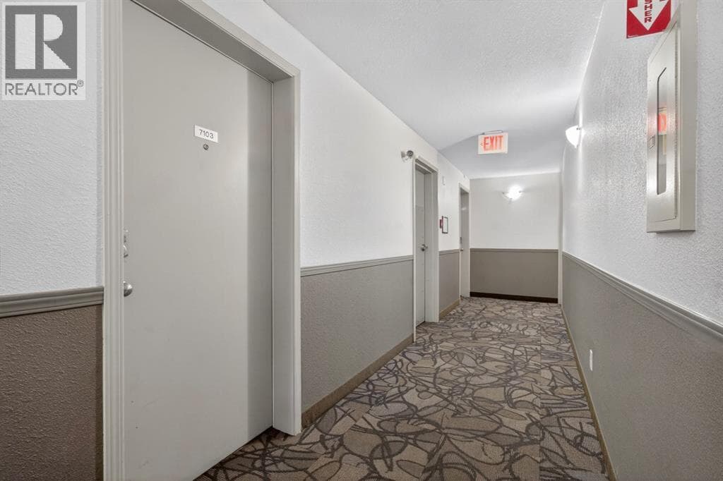 7103, 304 Mackenzie Way SW — photo 2