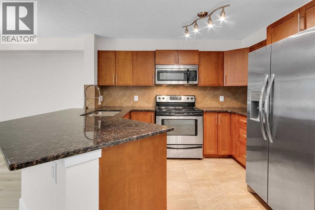 102, 500 Rocky Vista Gardens NW — photo 4