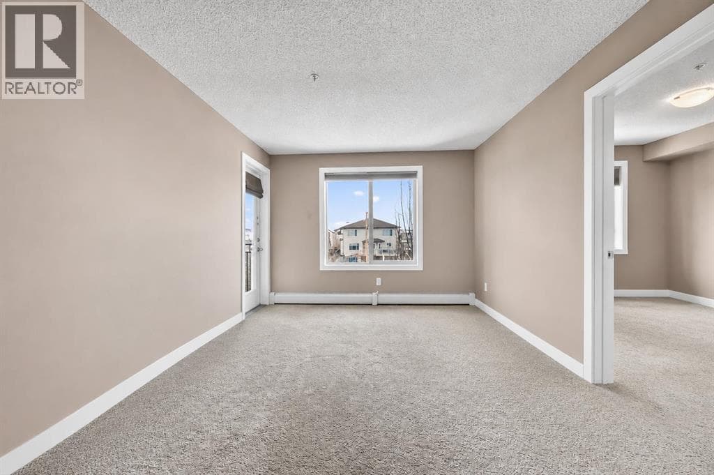 4317, 403 Mackenzie Way SW — photo 2