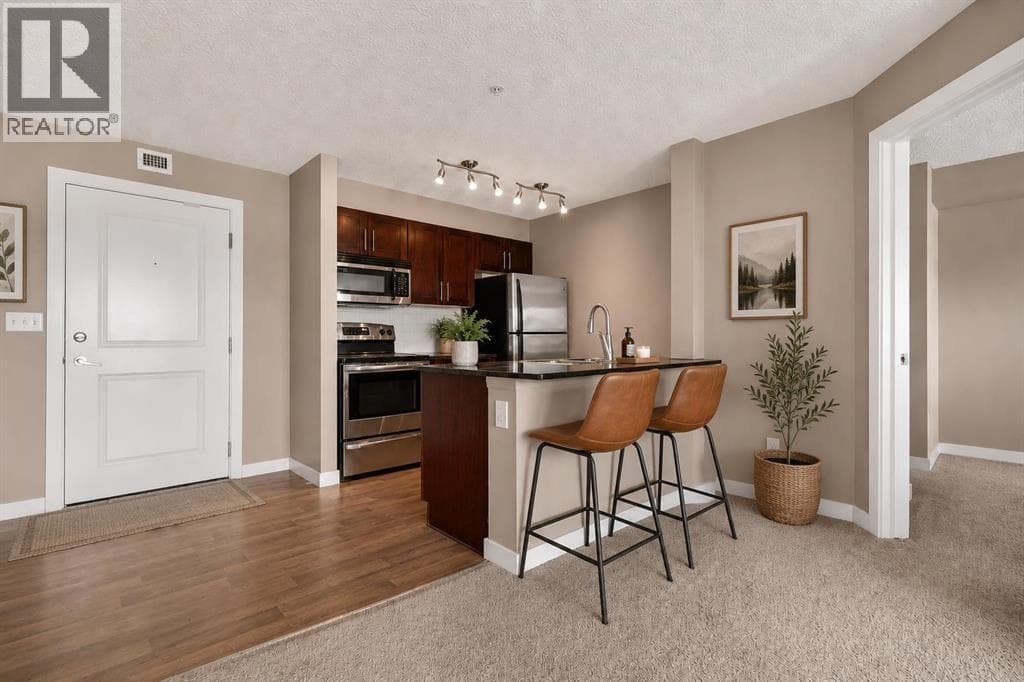 4317, 403 Mackenzie Way SW — photo 5