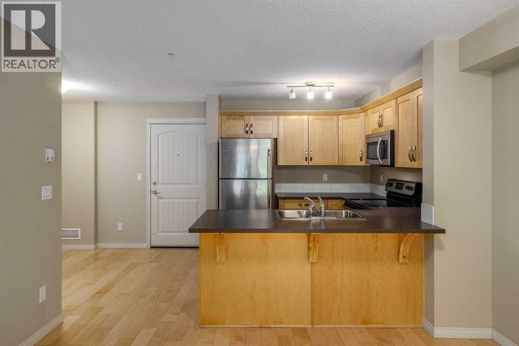 1113, 130 Panatella Street NW — photo 3