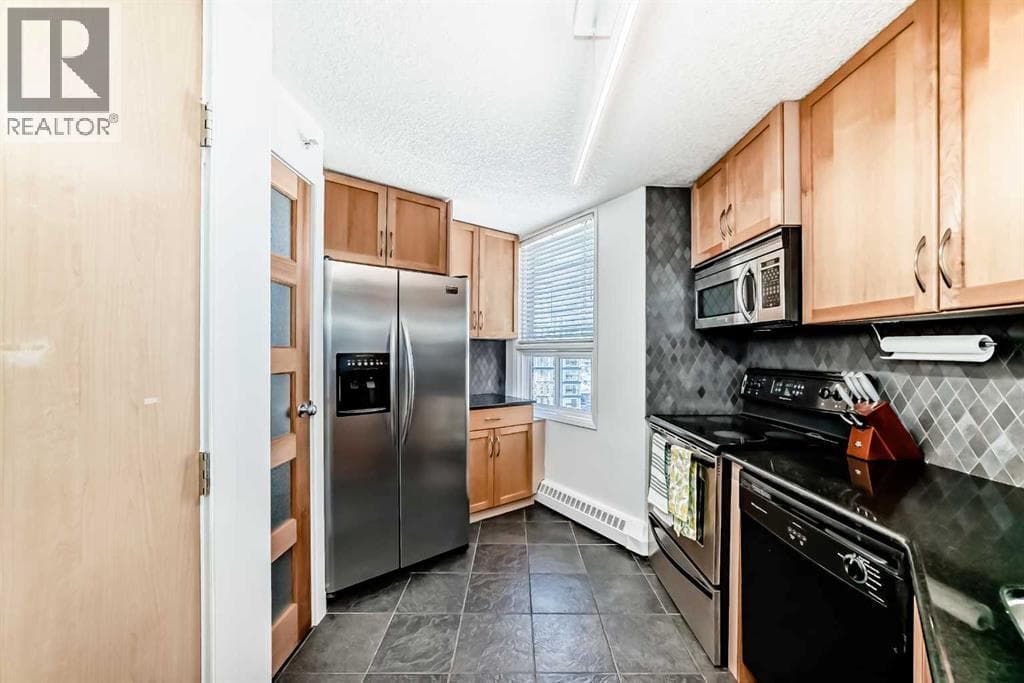 703, 626 15 Avenue SW — photo 5