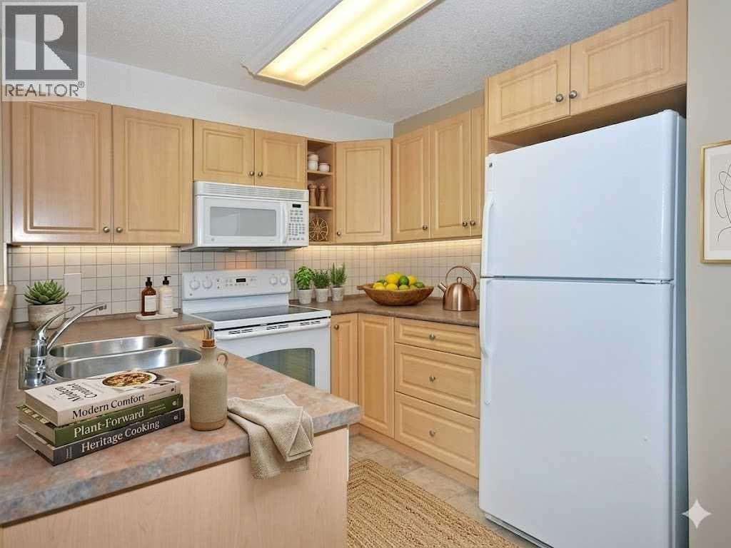 2310, 10 Prestwick Bay SE — photo 4