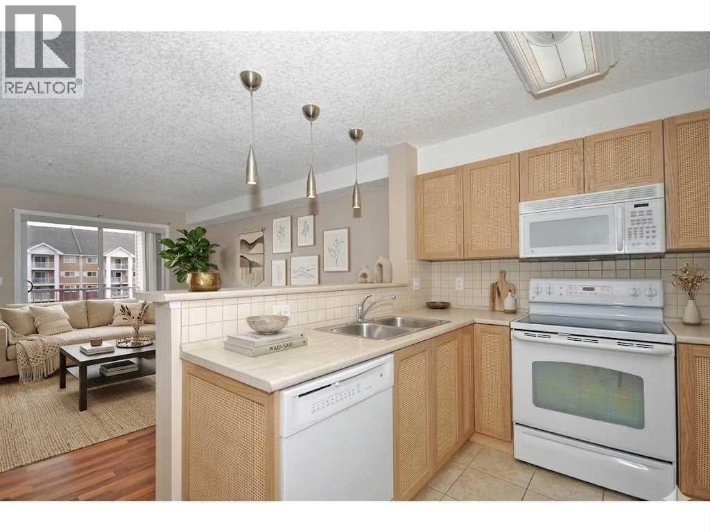 2310, 10 Prestwick Bay SE — photo 5