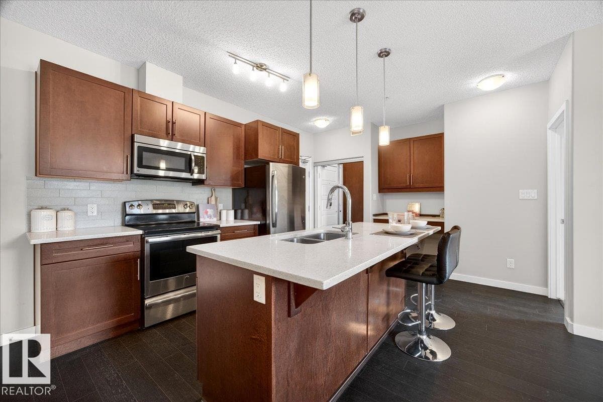#205 507 ALBANY WY NW