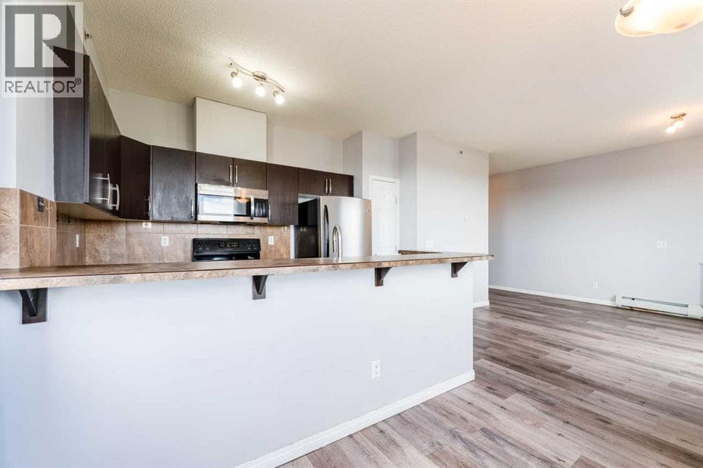 425, 1727 54 Street SE — photo 3