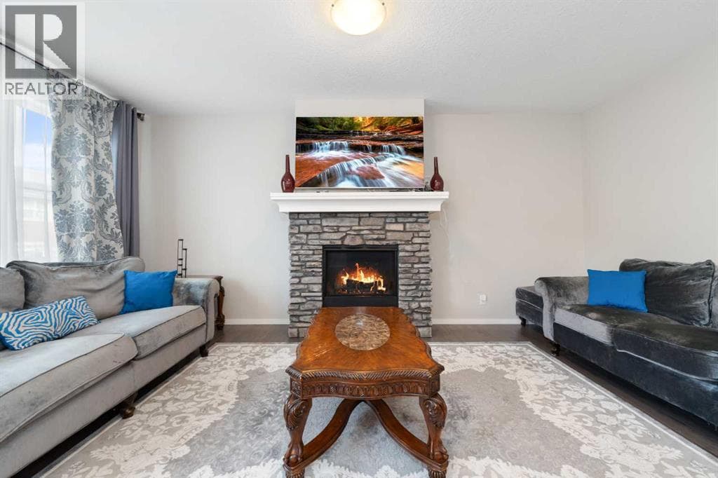 5 bed 4 bath single family at 229 Kingsbury Close SE — $699,990 — photo 8
