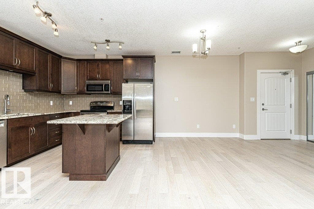 #256 6079 MAYNARD WY NW — photo 5