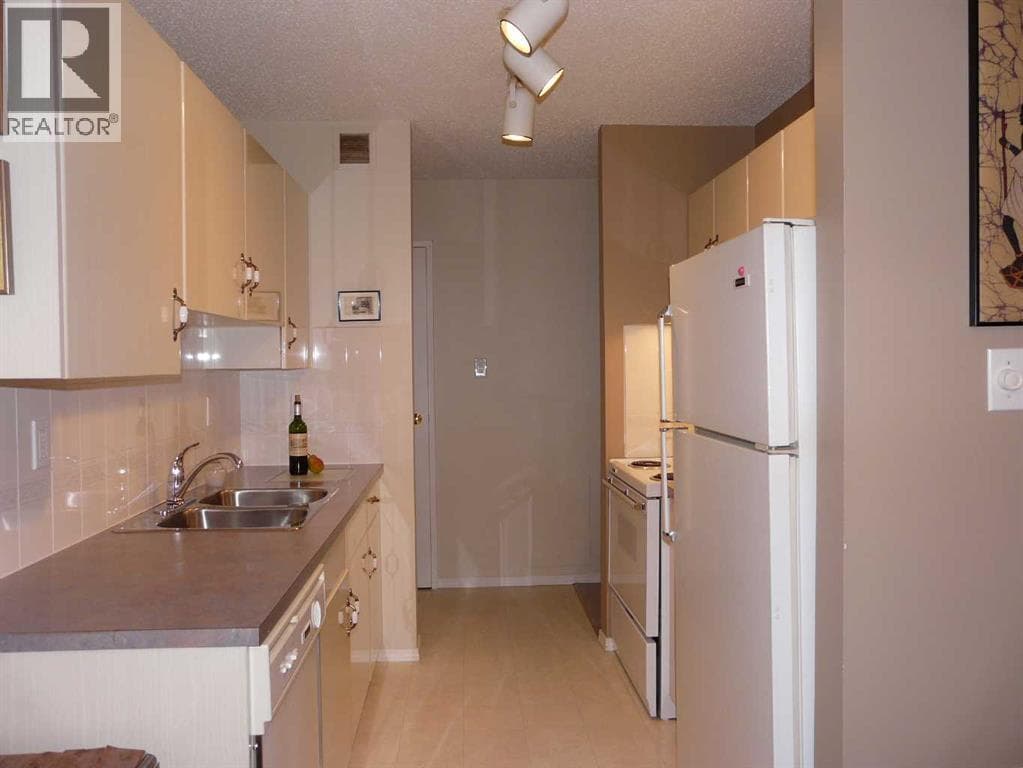 482, 8948 Elbow Drive SW — photo 2
