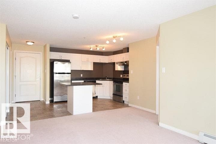 #2122 320 CLAREVIEW STATION DR NW — photo 2