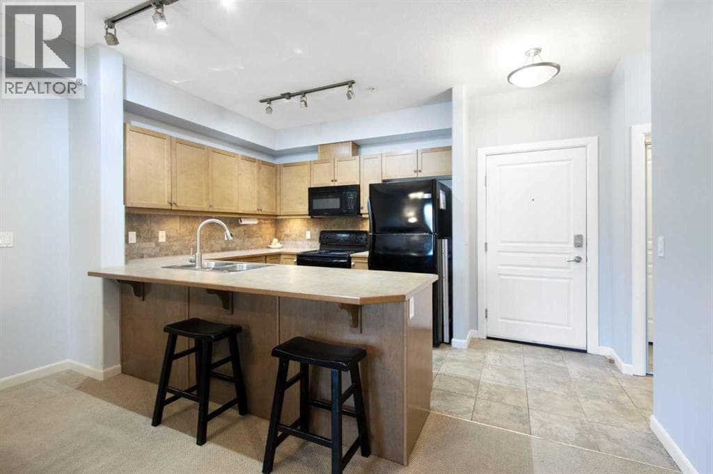 211, 52 Cranfield Link SE — photo 2