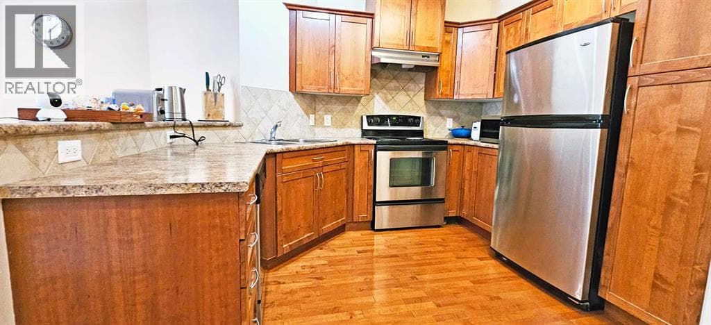 305, 30 Discovery Ridge Close SW — photo 4