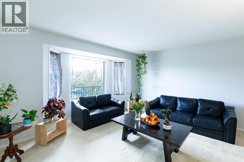 102, 950 Arbour Lake Road NW — photo 4