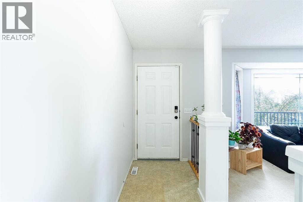 102, 950 Arbour Lake Road NW — photo 2