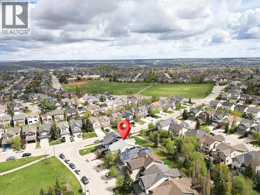 143 Cougarstone Square SW — photo 3