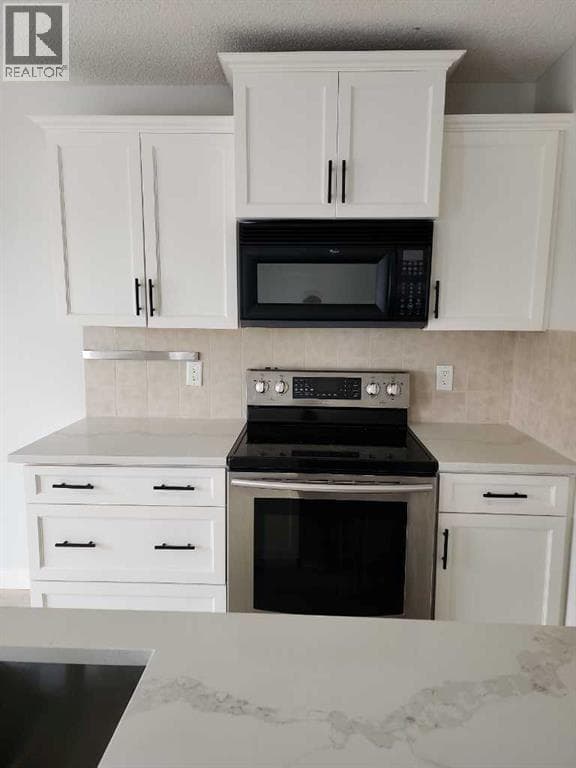 15 Tuscany Reserve Bay NW — photo 2
