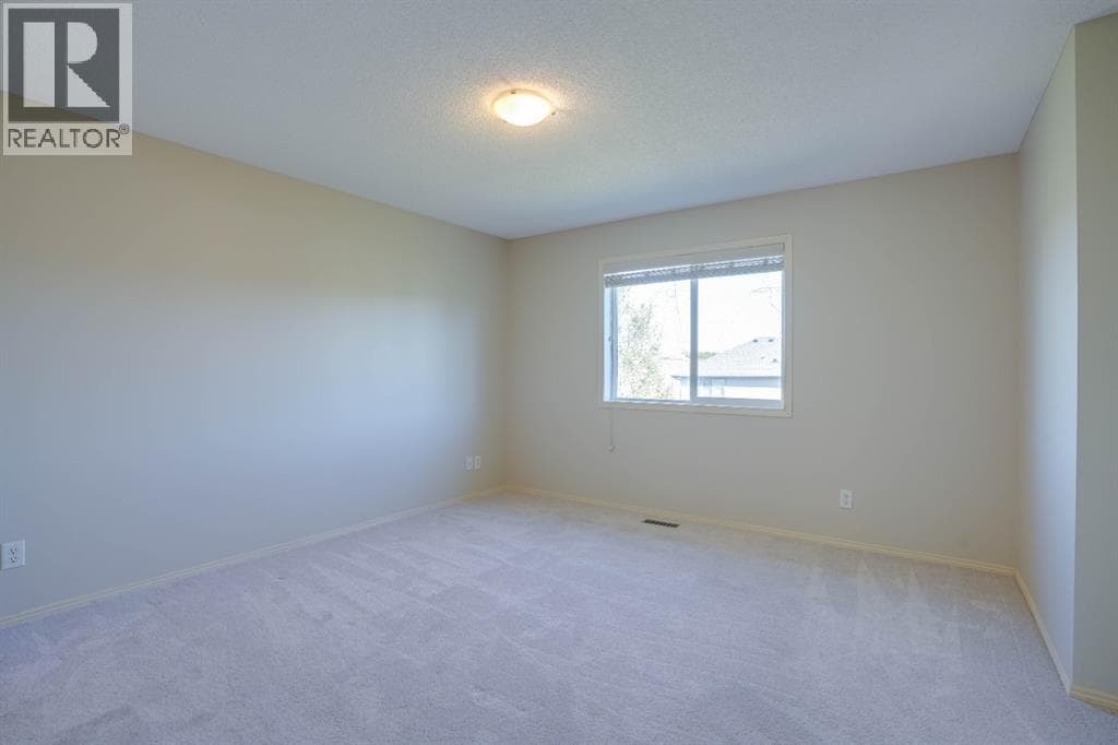 15 Tuscany Reserve Bay NW — photo 3