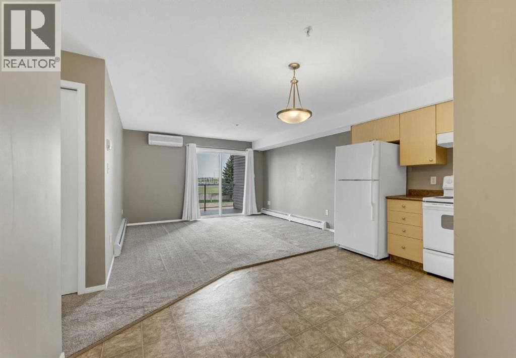 215, 1648 Saamis Drive NW — photo 5