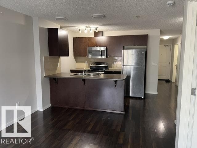 #118 3357 16A AV NW — photo 3