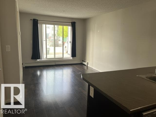 #118 3357 16A AV NW — photo 5
