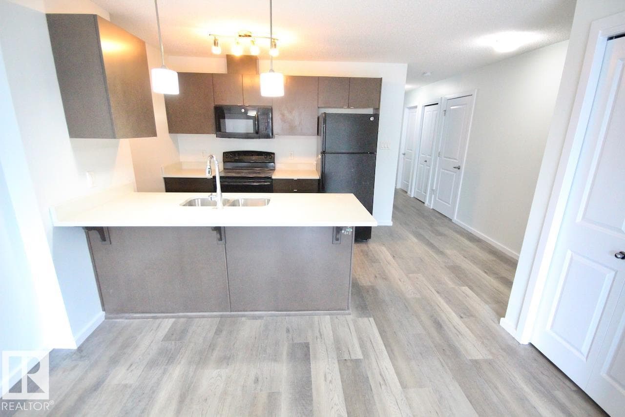 #408 340 WINDERMERE RD NW — photo 5