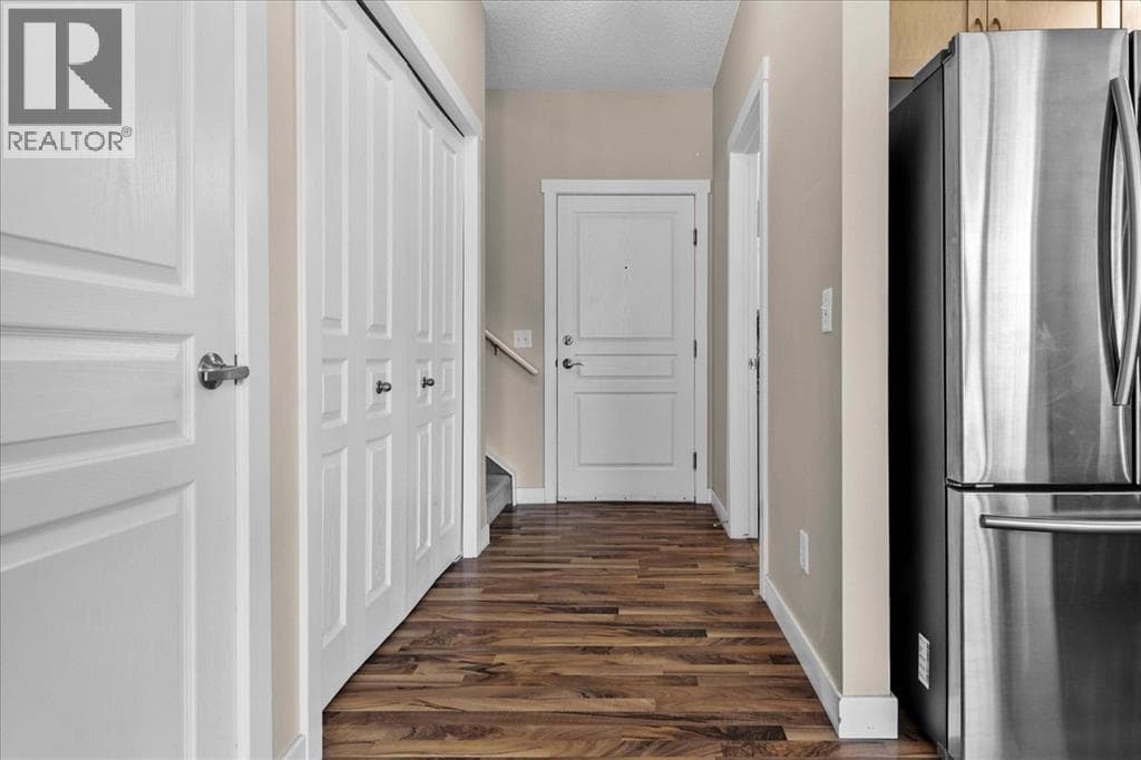 1210, 211 Aspen Stone Boulevard SW — photo 4