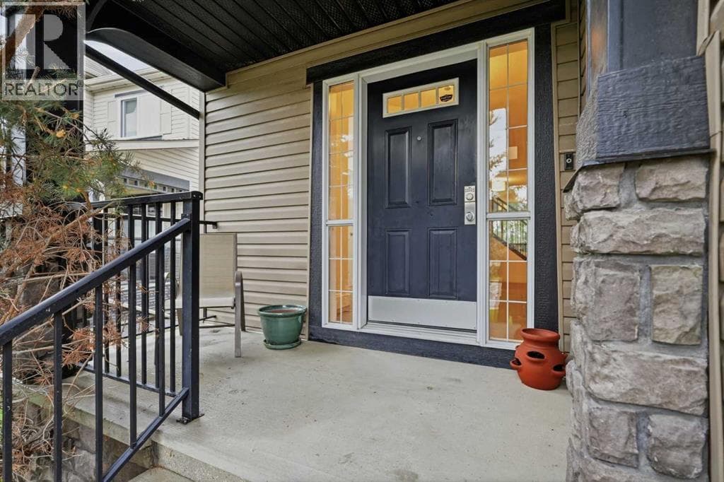 114 Cougarstone Crescent SW — photo 5