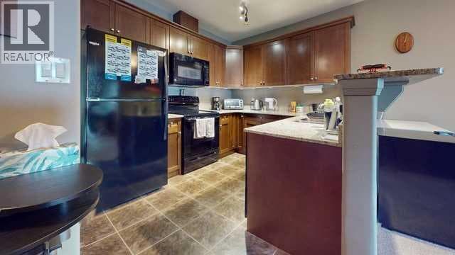 215, 8535 Clearwater Drive — photo 4