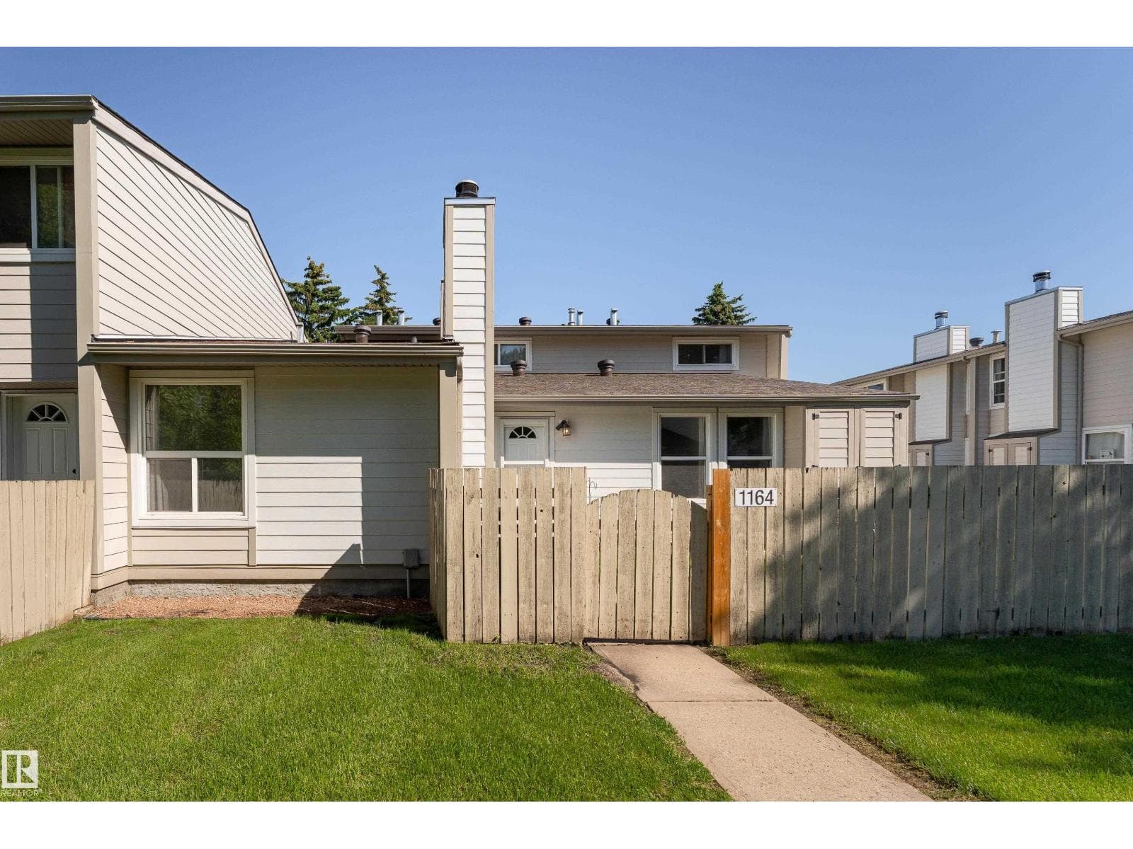1164 KNOTTWOOD RD E NW — photo 2