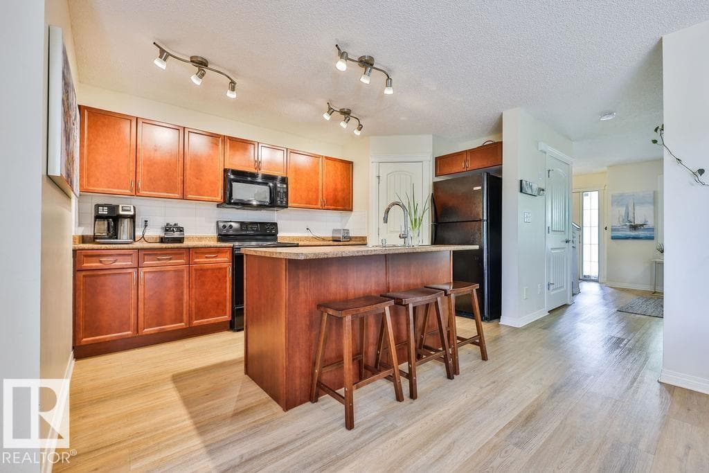 8760 STEIN LN NW — photo 5