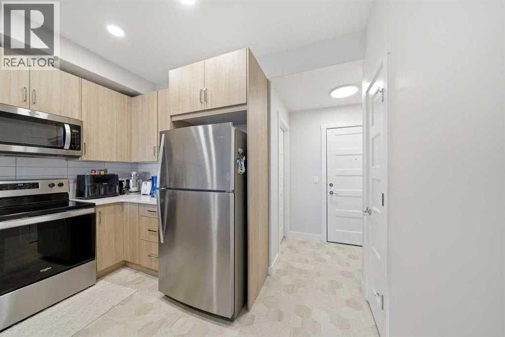 318, 55 wolf hollow Crescent SE — photo 2
