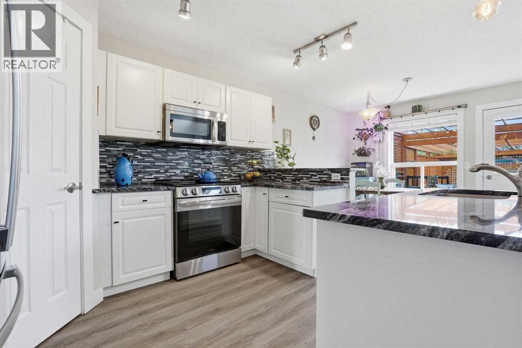 4 bed 4 bath single family at 121 Canoe Square SW — $524,900 — photo 12