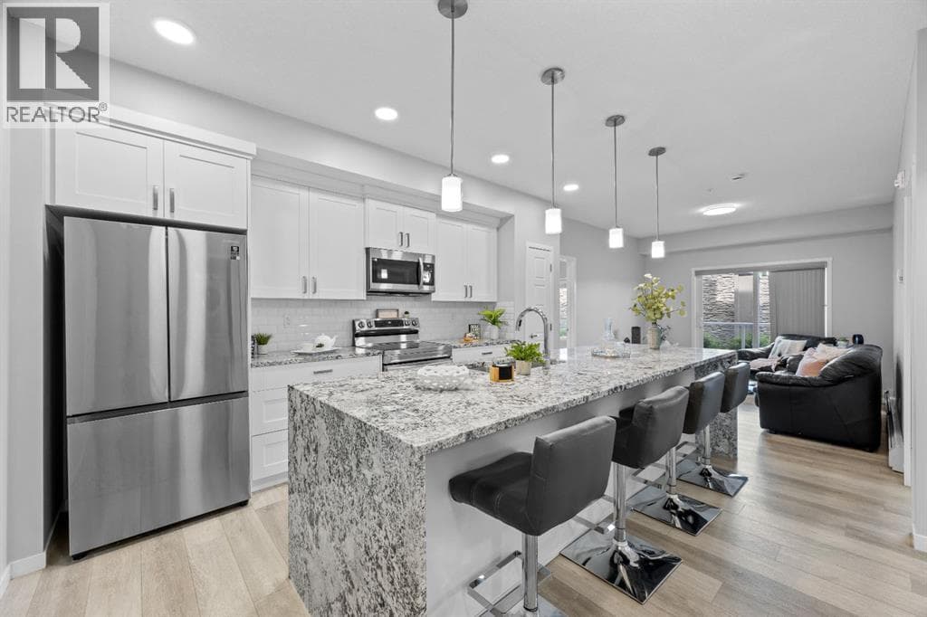 105, 200 Harvest Hills Place NE