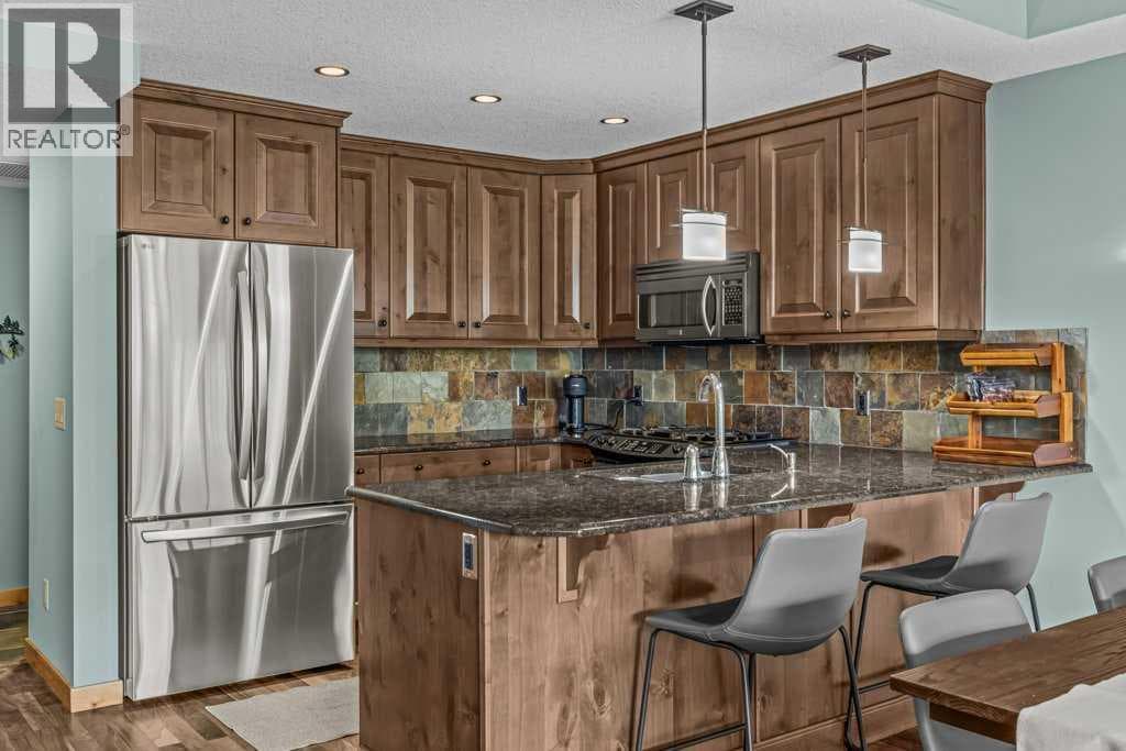 310, 600 Spring Creek Drive — photo 4