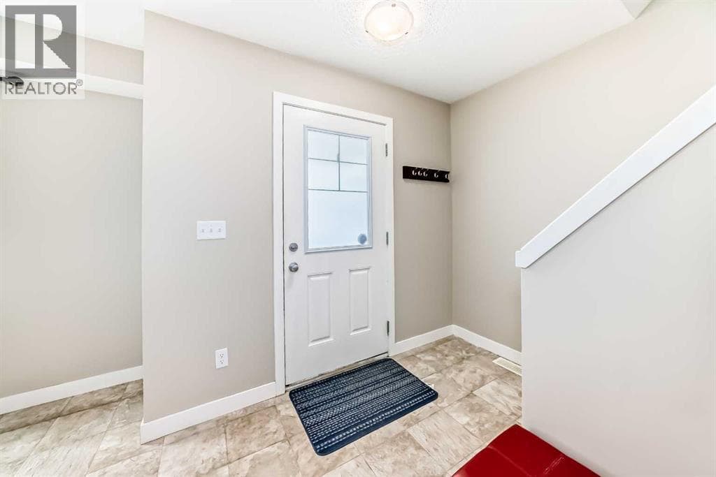 303, 250 Sage Valley Road NW — photo 4