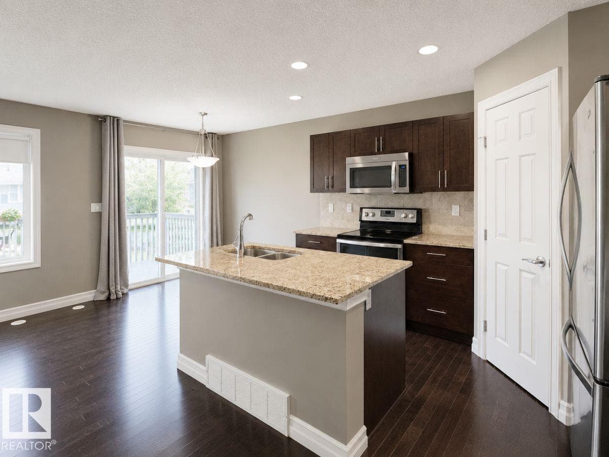 #66 219 CHARLOTTE WY — photo 2
