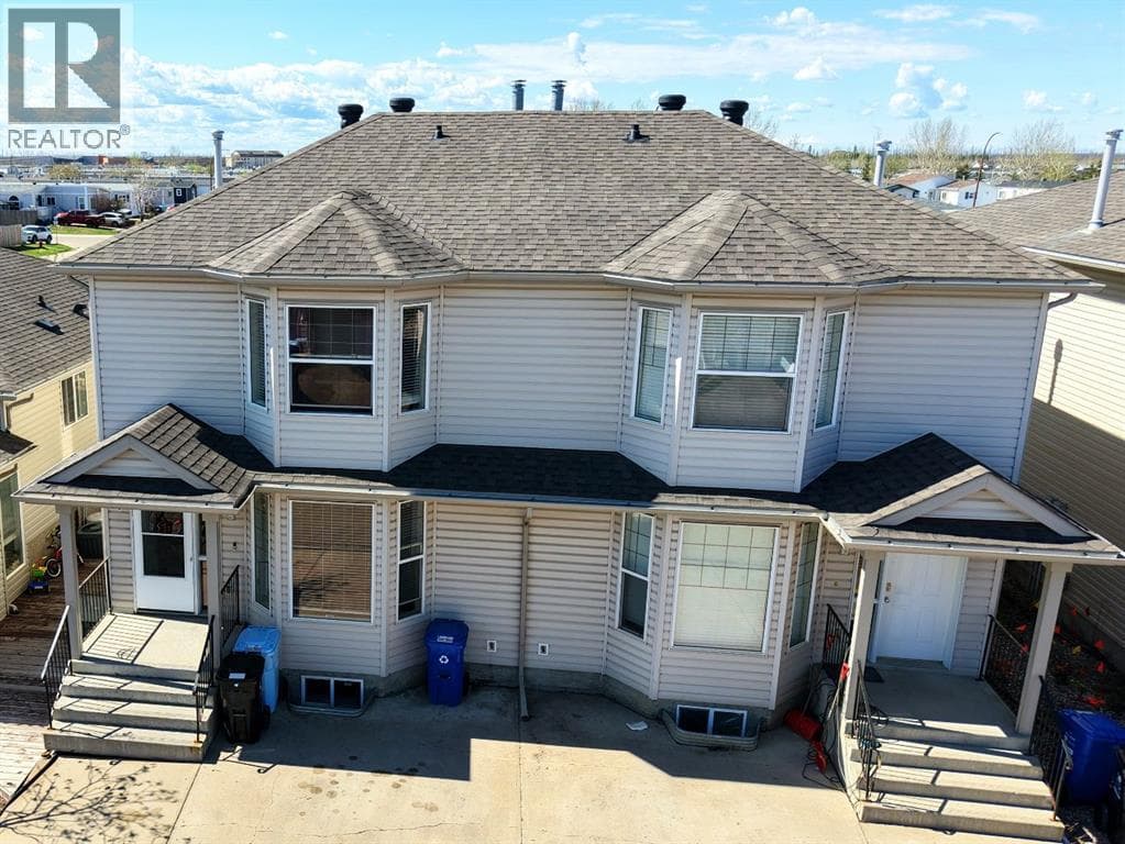 108 Kodiak Crescent — photo 3